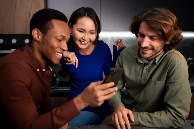 A diverse group of people looking relieved and happy while using mobile banking apps on their smartphones. They are smiling as they see notifications about overdraft fee waivers and alerts. Emphasis on financial relief and empowerment through technology.