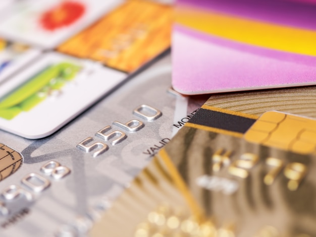 A close-up comparison chart showing the benefits of different credit card types: cash back percentages, travel point multipliers, and special offer details. The chart is designed to be visually appealing and easy to understand.