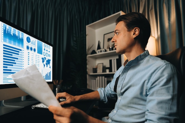 A person carefully reviewing a document with financial charts and graphs, highlighting the importance of monitoring financial accounts and transactions regularly.