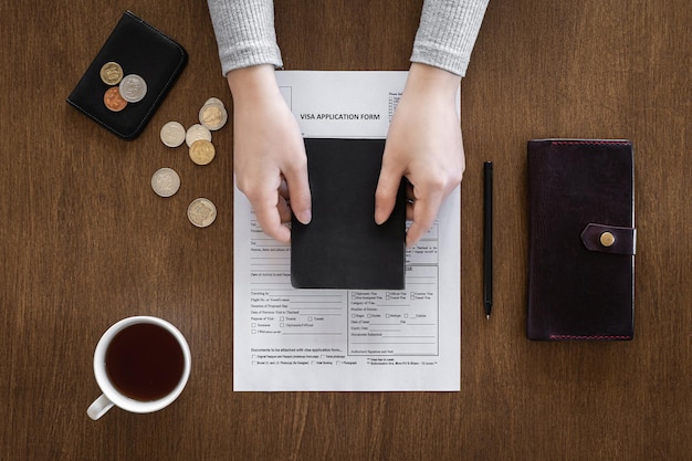 A close-up image of a US tax form 8949 with a hand pointing at the section for reporting capital gains and losses from cryptocurrency transactions.