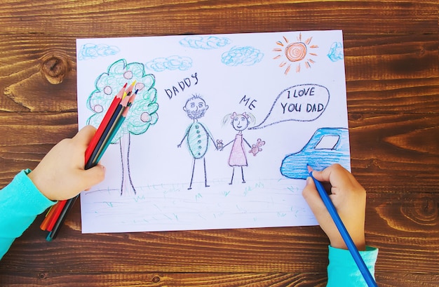 A happy child drawing at a daycare center, highlighting the quality care services that can be paid for with a Dependent Care FSA.