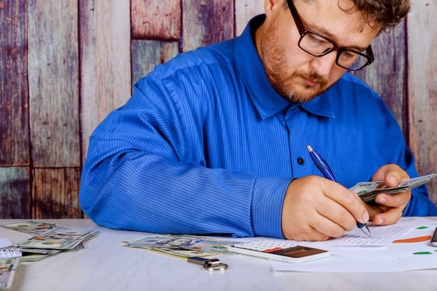 A person writing in a notebook at a desk with various bills and financial documents spread around, symbolizing the detailed tracking and analysis of expenses to understand one's financial situation.