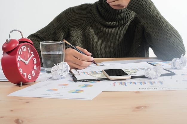 A person reviewing financial documents at a table, highlighting the importance of monitoring the achieved progress and making necessary updates to the planning.