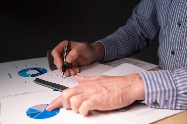 An image showing a person reviewing financial documents with a pen in hand, highlighting the importance of strategic financial planning.
