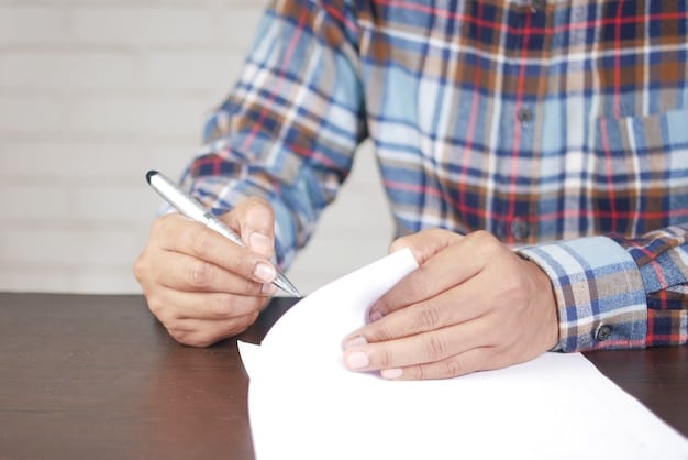 An individual carefully filling out a Form W-4, with a pen in hand, emphasizing attention to detail, and a tax guide open on the side.