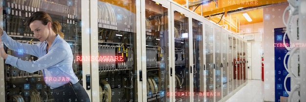 A sleek, modern data center filled with rows of servers, with technicians working diligently. The image should convey a sense of technological innovation, illustrating how advanced infrastructure supports economic growth.