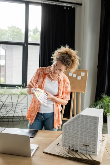 A homeowner reviewing receipts and documents related to energy-efficient home improvements.